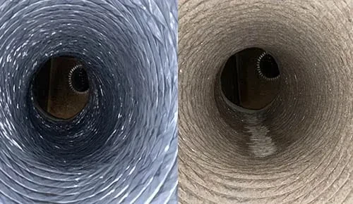 Superior Attic technician cleaning residential air ducts