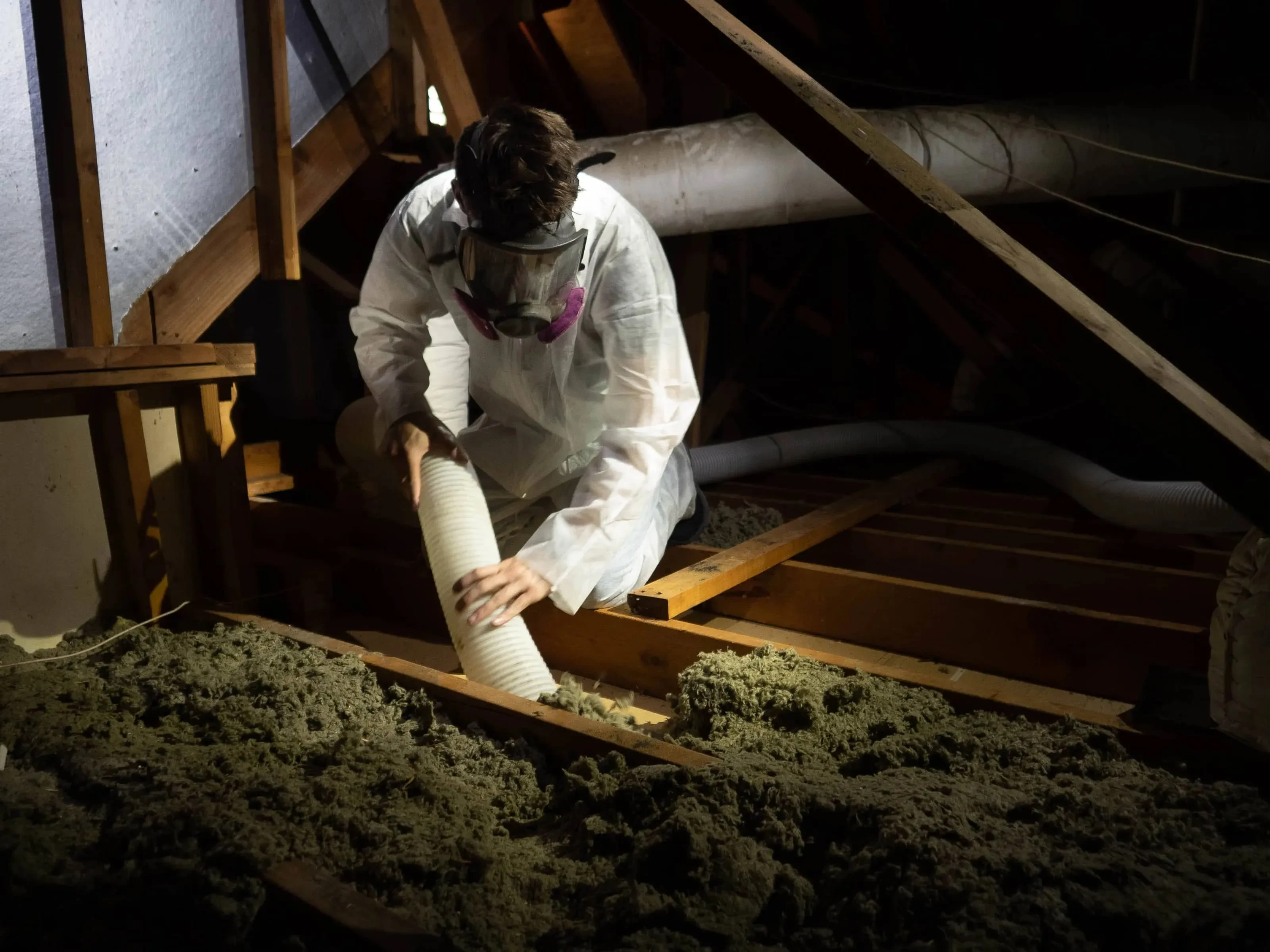 Attic part-way through insulation removal